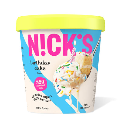 Pint of N!CK'S Birthday Cake light ice cream. The label highlights 'no added sugar' and '320 calories/pint'. A spoon holds a scoop of ice cream with sprinkles, a piece of cake, and a lit candle.