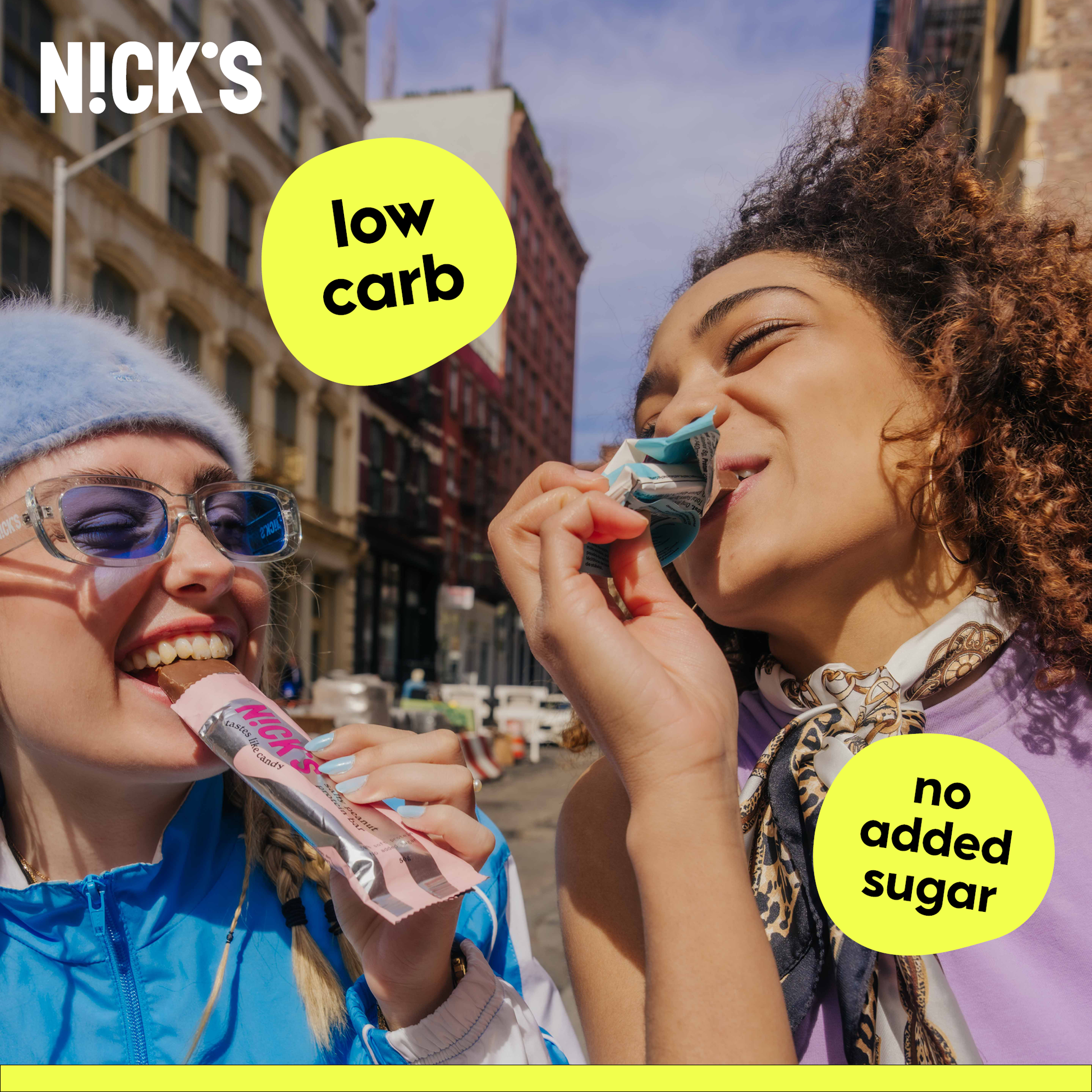 Close-up of an unwrapped N!CK'S Peanut & Fudge Candy Bar and Coconut Candy Bar in a lifestyle shot.