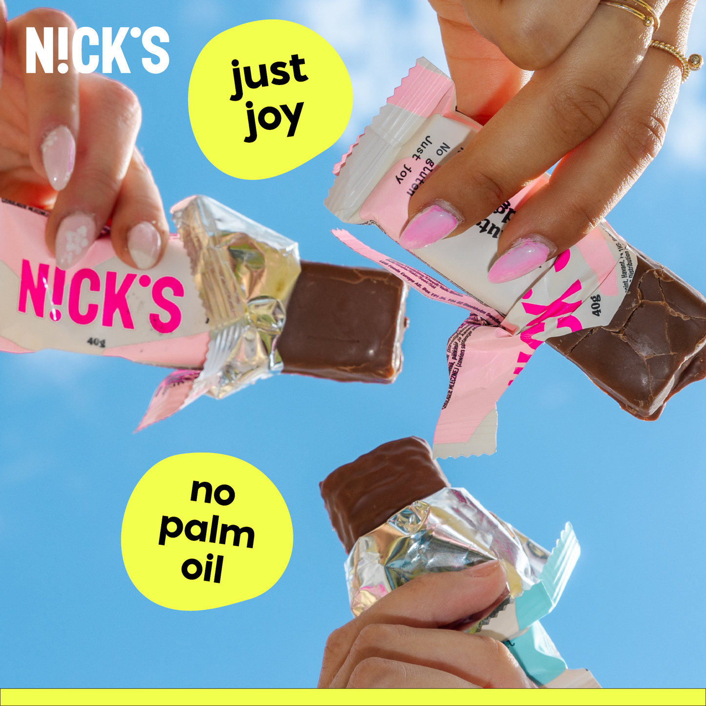 A variety of N!CK'S Peanut & Fudge and Coconut Candy Bars displayed together with the mix box.