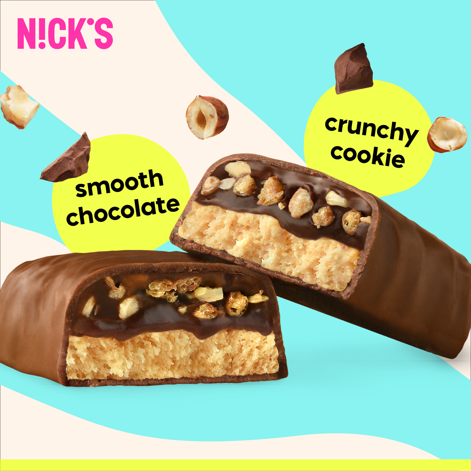 Close-up cross-section of a N!CK'S Crispy Cookie Protein Bar, clearly showing crunchy cookie pieces over a soft protein base, coated in smooth chocolate.