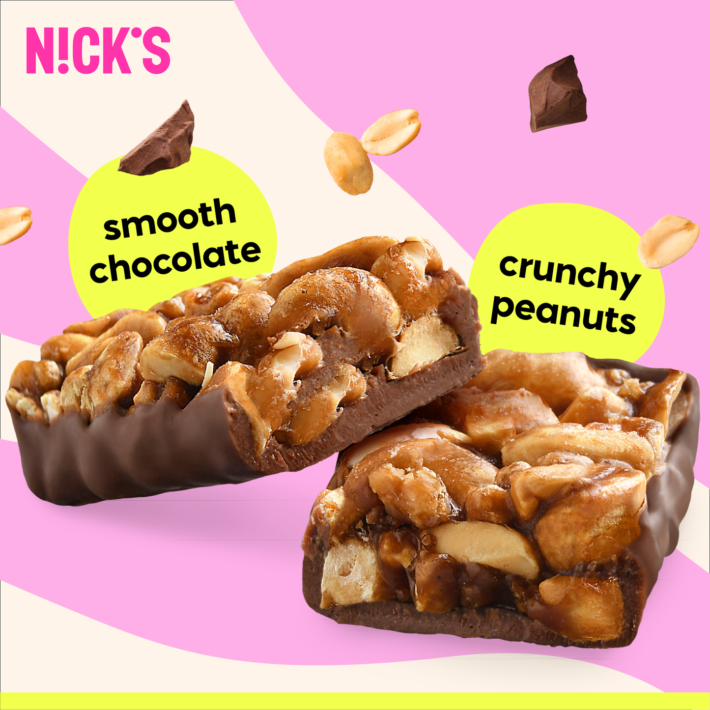 Close-up cross-section of a N!CK'S Peanut Crunch Nut Bar, clearly showing crunchy peanuts mixed with a layer of smooth chocolate coating.